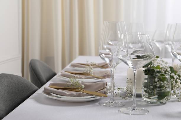 istock Beautiful table setting with floral decor indoors 1855559182