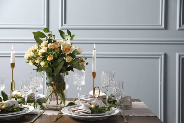 istock Beautiful table setting with floral decor indoors, space for text 1855560264