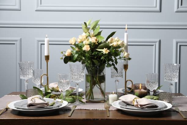 istock Beautiful table setting with floral decor indoors 1855561819