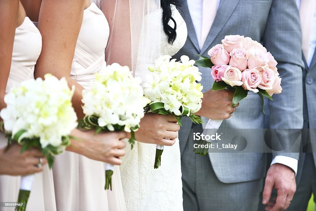 Beautiful wedding bouquet Beautiful wedding bouquet in hands of the bride and bridesmaids Adult Stock Photo