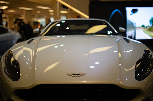 An Aston Martin sports car is displayed in one of the wealthier areas of Bangkok, Thailand