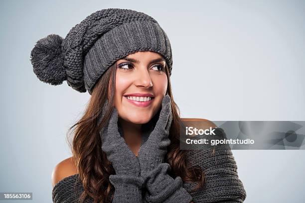 Gorgeous Young Woman Wearing Winter Clothes Looking At Copy Space Stock Photo - Download Image Now