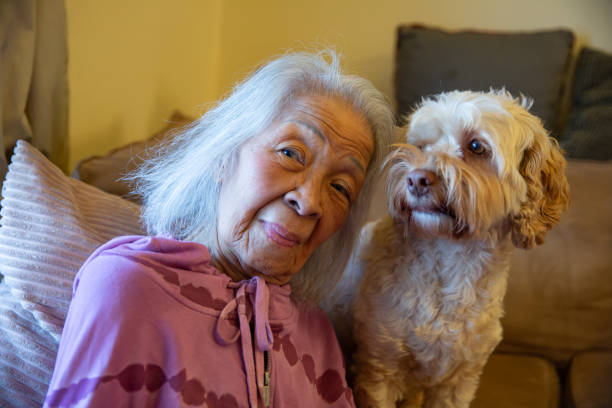 istock Elderly Senior Woman and Her Dog 1855673849