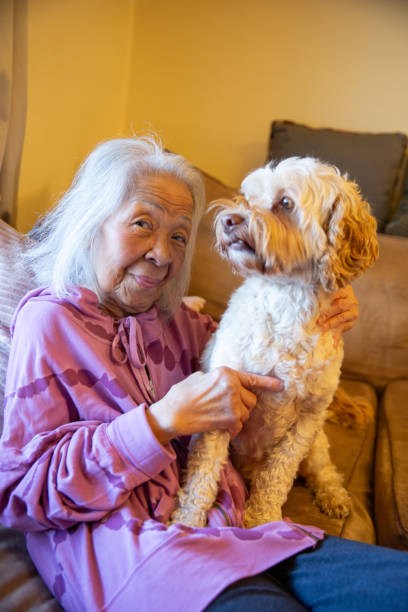 istock Elderly Senior Woman and Her Dog 1855673865
