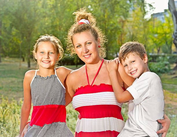 istock Happy family  In summer park 185568638