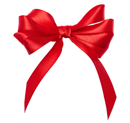 Knotted bow made of red silk ribbon on an isolated background, decor for a gift