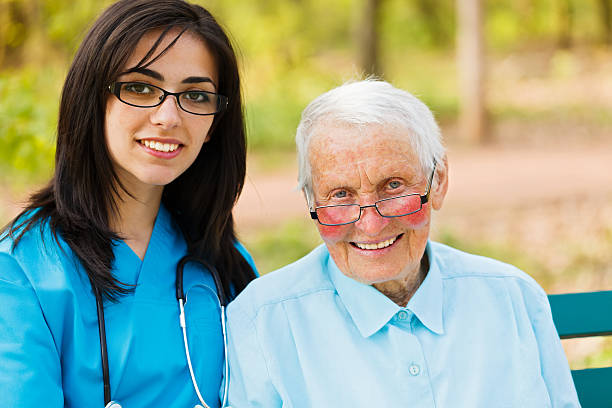 istock Portrait of Nurse and Elderly Patient 185577292