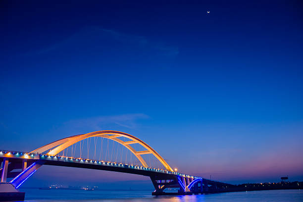 istock Xiamne wuyuan bridge and moon 185577937