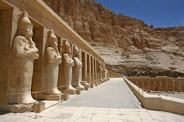Mortuary Temple of Hatshepsut Egypt. Osiris Mortuary Temple of Hatshepsut, near the Valley of the Kings, in Luxor, Egypt. A row of statues of Queen Hatshepsut as Osiris temple of hatshepsut photos stock pictures, royalty-free photos & images