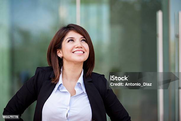 Happy Businesswoman Looking Up Stock Photo - Download Image Now - Looking Up, Businesswoman, Asian and Indian Ethnicities