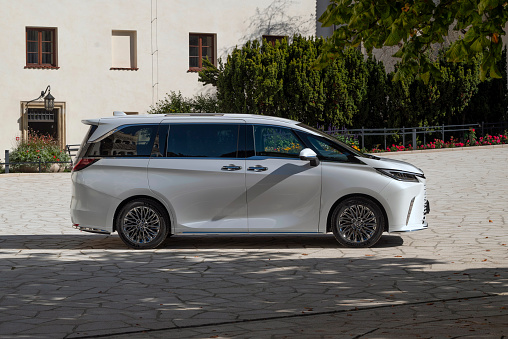 Cracow, Poland - 28th September, 2023: Luxury hybrid minivan Lexus LM 350h on a parking. This model is the most luxury vehicle in Lexus offer in Europe.