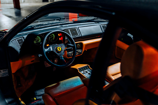 Seattle, WA, USA\n12/14/2023\nBlack Ferrari F355 parked showing the steering wheel