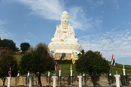 Guan Yin Bodhisattva Statue The largest Kuan Yin statue in Thailand. It has a height of approximately 79 meters and is located on a hill. Looks outstanding and elegant. AT Wat Huay Pla Kang temple in Chiang Rai Province in Thailand.