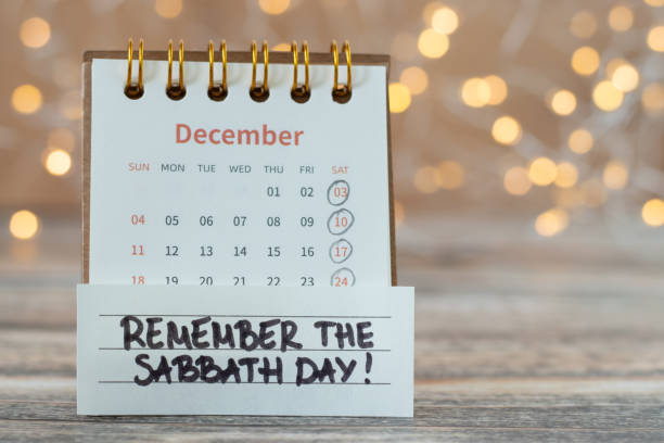 istock Remember Sabbath Day, handwritten quote with calendar on wooden table with bokeh background 1855844440