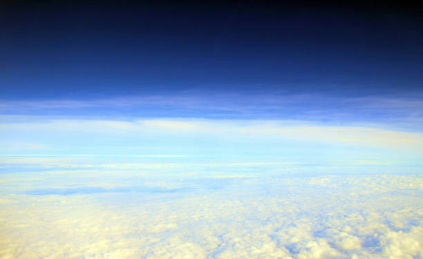 istock blue sky and clouds background.in-flight photography. 1855850479