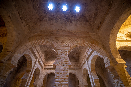 view inside The ruins of the ancient Arab Baths in the Moorish Alcazar, Jerez de la Frontera, Cadiz Province, Andalucia, Spain.