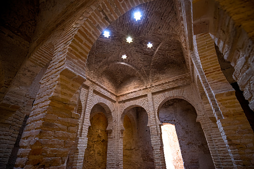 view inside The ruins of the ancient Arab Baths in the Moorish Alcazar, Jerez de la Frontera, Cadiz Province, Andalucia, Spain.