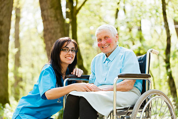 istock Smiling Doctor with Kind Woman 185586935