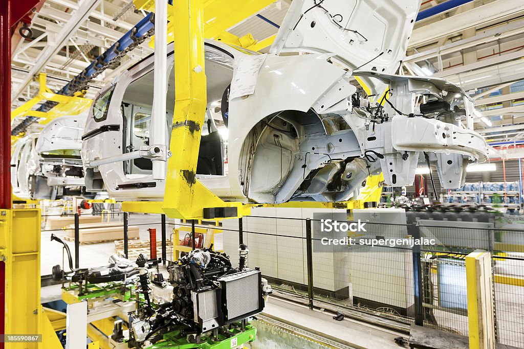 Car production Empty car body shells on production line Car Stock Photo