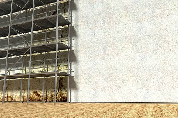 istock 3d scaffolding and renovated wall 185590974