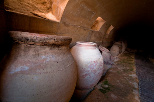 Jars of clay to preserve foods in the cellar. La Mota castle, Alcala la real, Jaen, Spain
