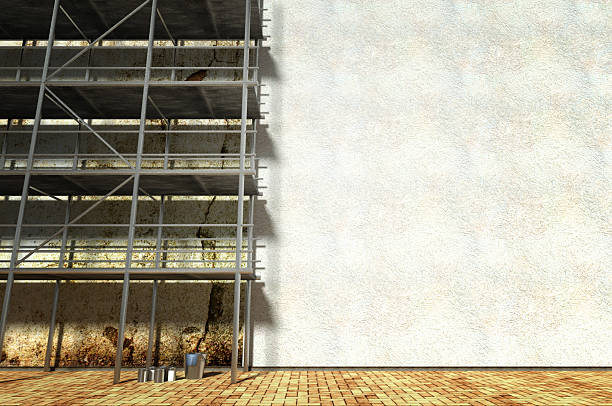 istock 3d scaffolding and renovated wall 185591360