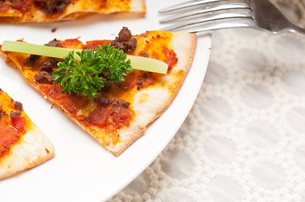 istock Turkish beef pizza with cucumber on top 185591378
