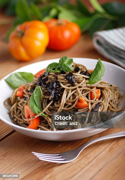 Spaghetti With Squid Ink Stock Photo - Download Image Now - Basil, Black Color, Calamari