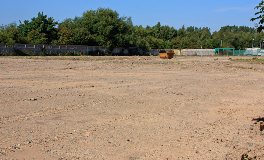 Prepared brown field site flattened and cleared ready for new build construction