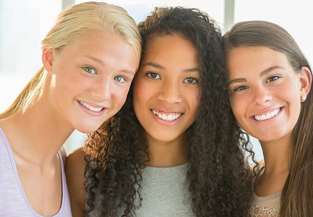 istock Happy Female Friends At Home 185594074