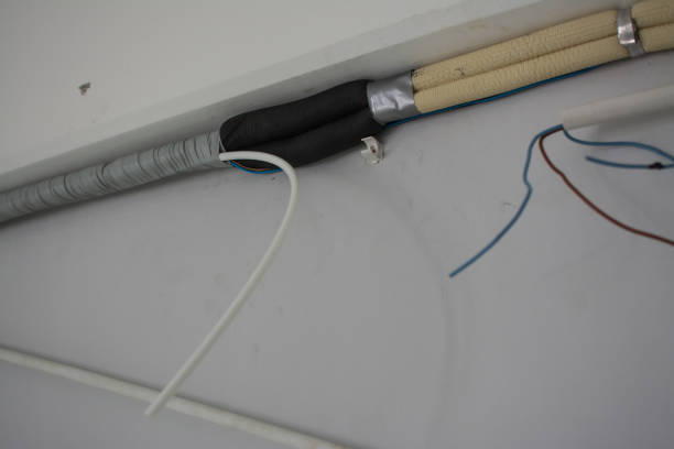 istock air conditioner drain hose with insulation. indoor unit. 1855979812