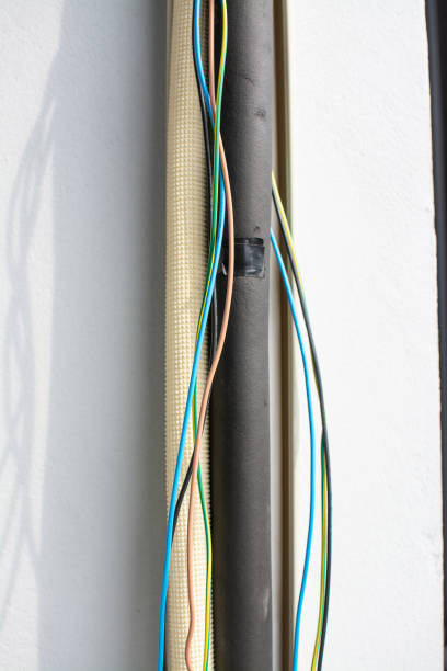 istock air conditioner hose with insulation. outdoor unit. 1855980334