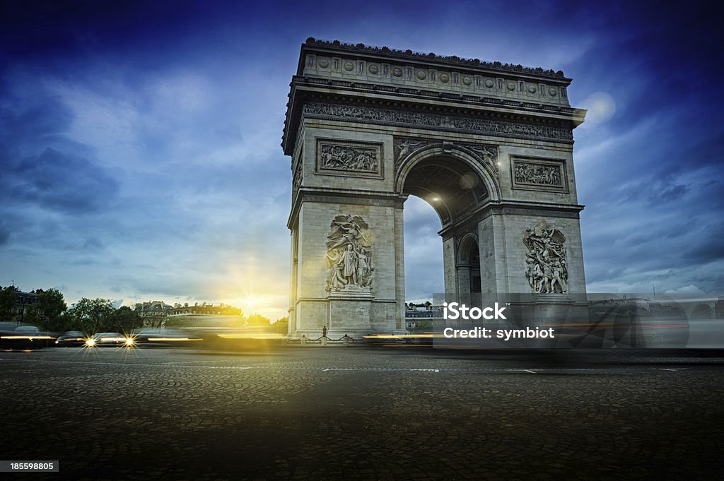 Arc de Triomphe at night Arc de Triomphe at night. Beautiful sunset over Place de l'Etoile, Paris Arc de Triomphe - Paris Stock Photo