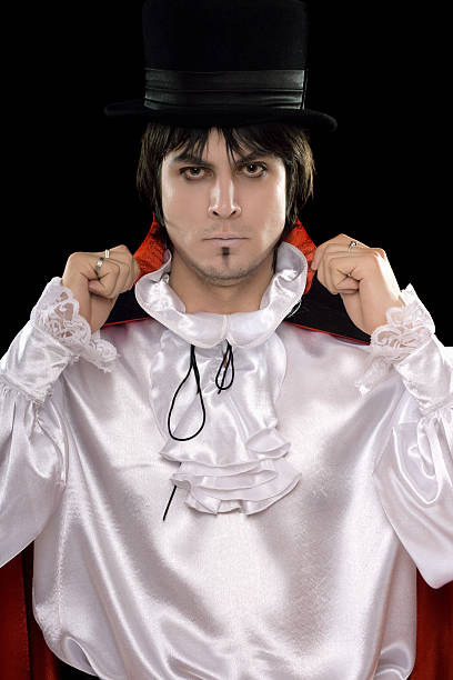istock Young man in a suit of Count Dracula 185601332