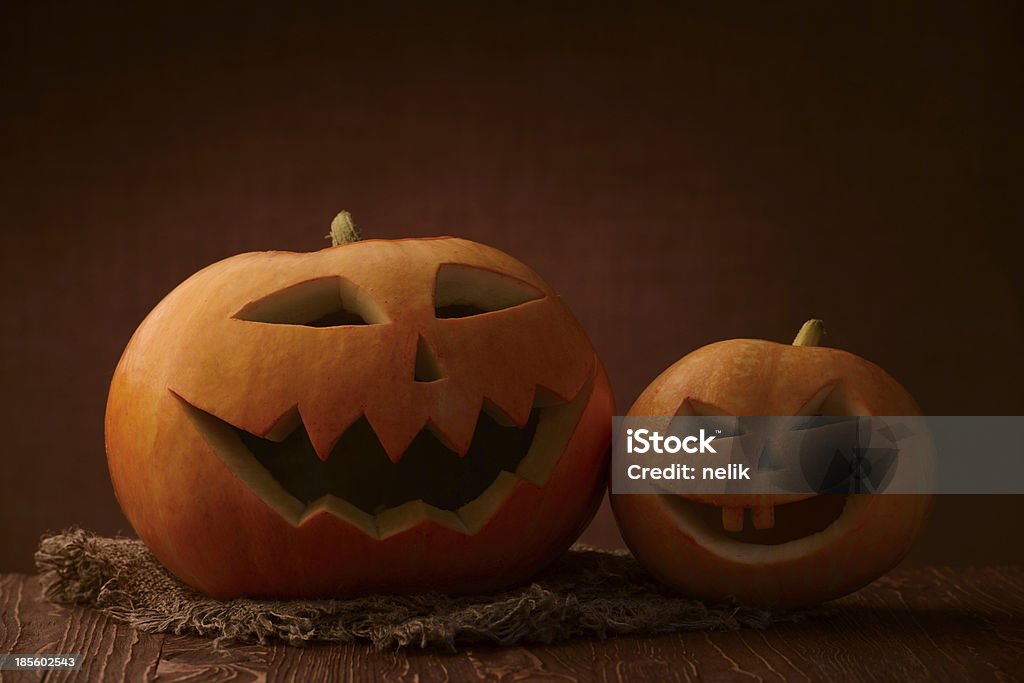 Spaventoso halloween Zucca dell'olivo - Foto stock royalty-free di Antropomorfo