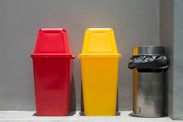 istock Colorful bins and smoke bin outside a building 185603005