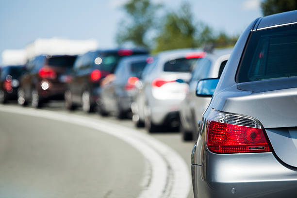 traffic jam traffic jam with waiting cars in tourist traffic traffic stock pictures, royalty-free photos & images
