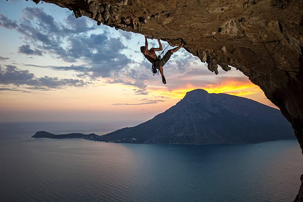 istock Male rock climber at sunset 185605997