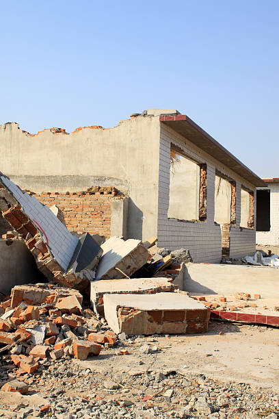 istock demolition of smoldering rubble 185610578