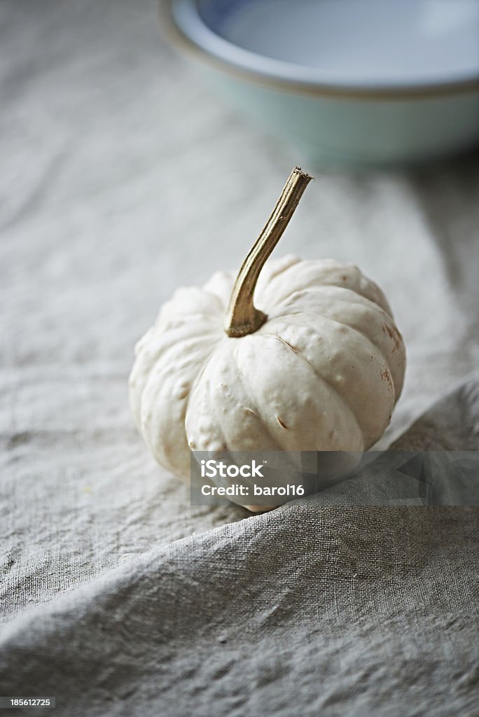 White Pumpkin still life with white pumpkin on a linen cloth Autumn Stock Photo