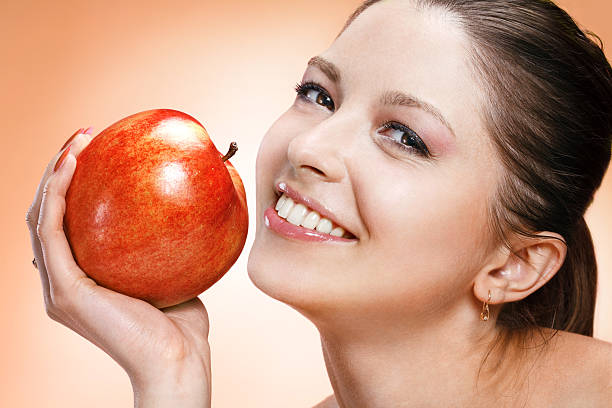 istock Appealing woman with apple 185612881