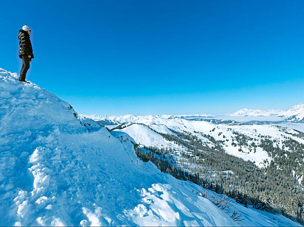 istock Woman on winter mountain top 185616903