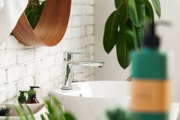 istock Washbasin with faucet in modern bathroom close up 1856172331