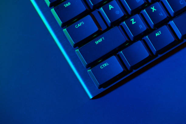 istock Close up of computer keyboard on black background 1856172895