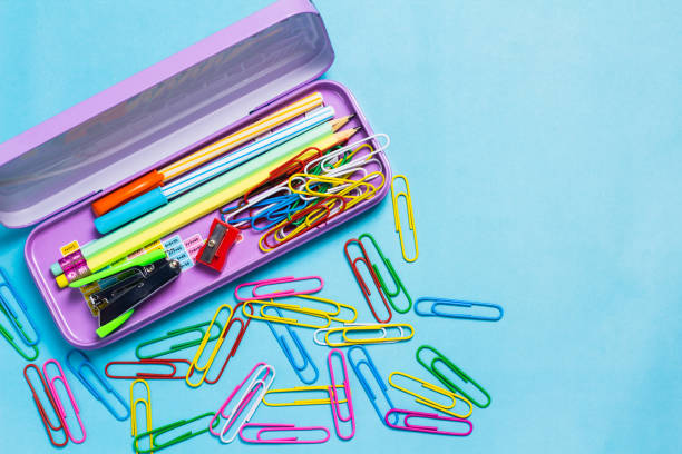 istock box for school supplies on blue background 1856193170