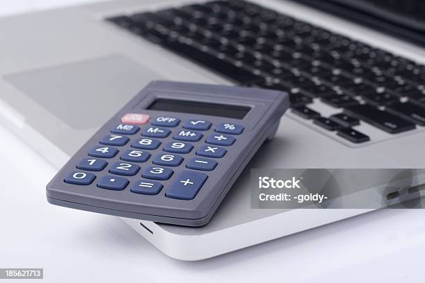 Calculator On The Laptop Keyboard Stock Photo - Download Image Now - Balance, Business, Business Plan