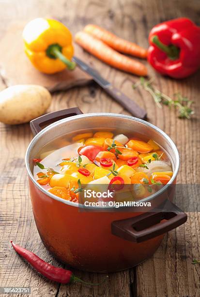 Vegetable Soup In Red Pot Stock Photo - Download Image Now - Carrot, Casserole, Chili Pepper