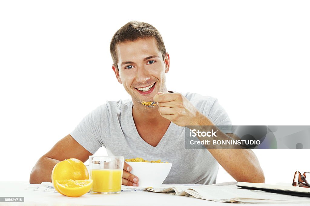 Feliz joven con energía de desayuno - Foto de stock de Adulto libre de derechos