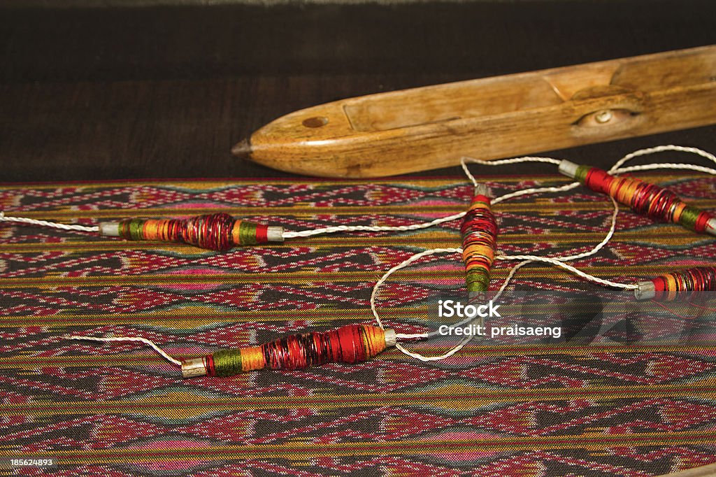 Spule thread und der hölzernen bobbin, traditionelle thai-Tuch weavin - Lizenzfrei Bunt - Farbton Stock-Foto