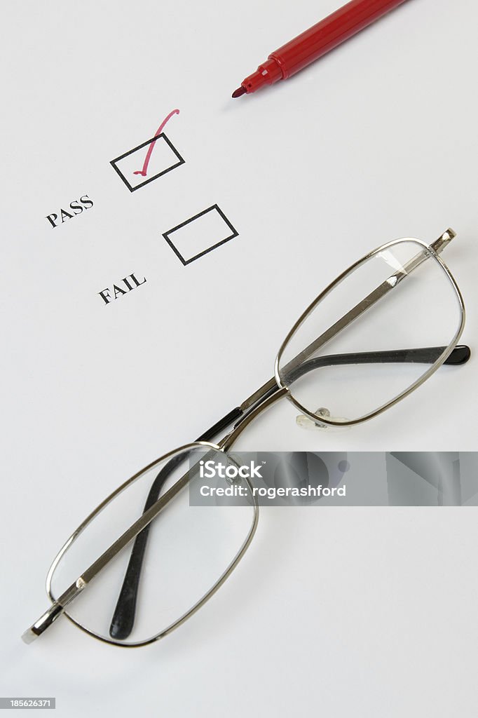 Check List - Pass Quality control or exam check list with tick, red pen and glasses Abstract Stock Photo